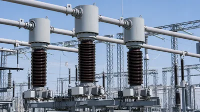 High voltage current transformer installed in a high-voltage electrical substation switchyard