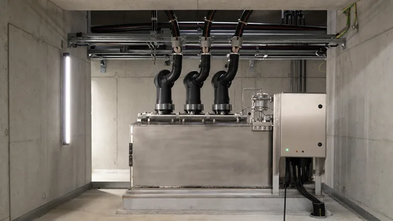 Submersible stainless steel underground switchgear installed within a concrete utility distribution vault